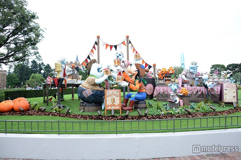 グーフィー、ケーキの大食い大会のフォトロケーション