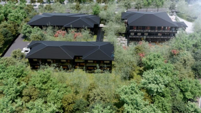 母屋と2つの客室棟からなるホテル