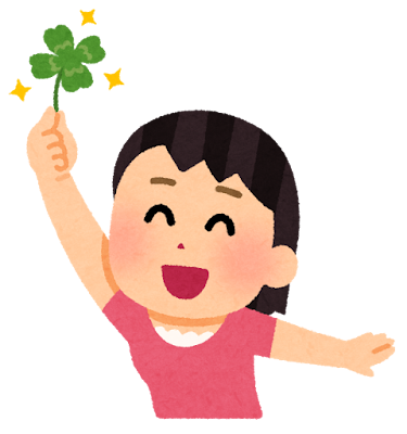 四つ葉のクローバーを発見した人のイラスト(女性)