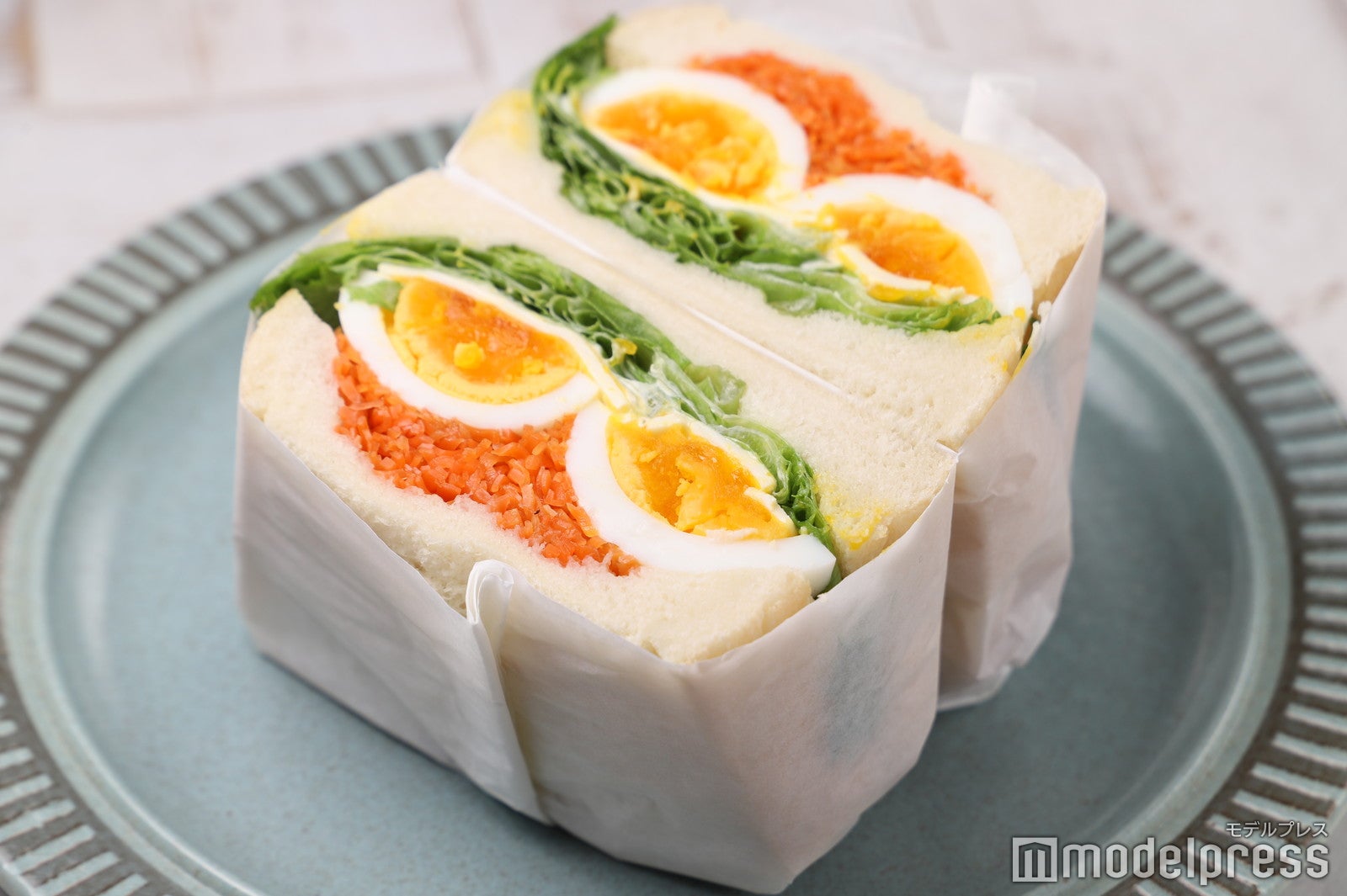 キャロットラペと平飼い有精卵の米粉パンサンドイッチ（C）モデルプレス
