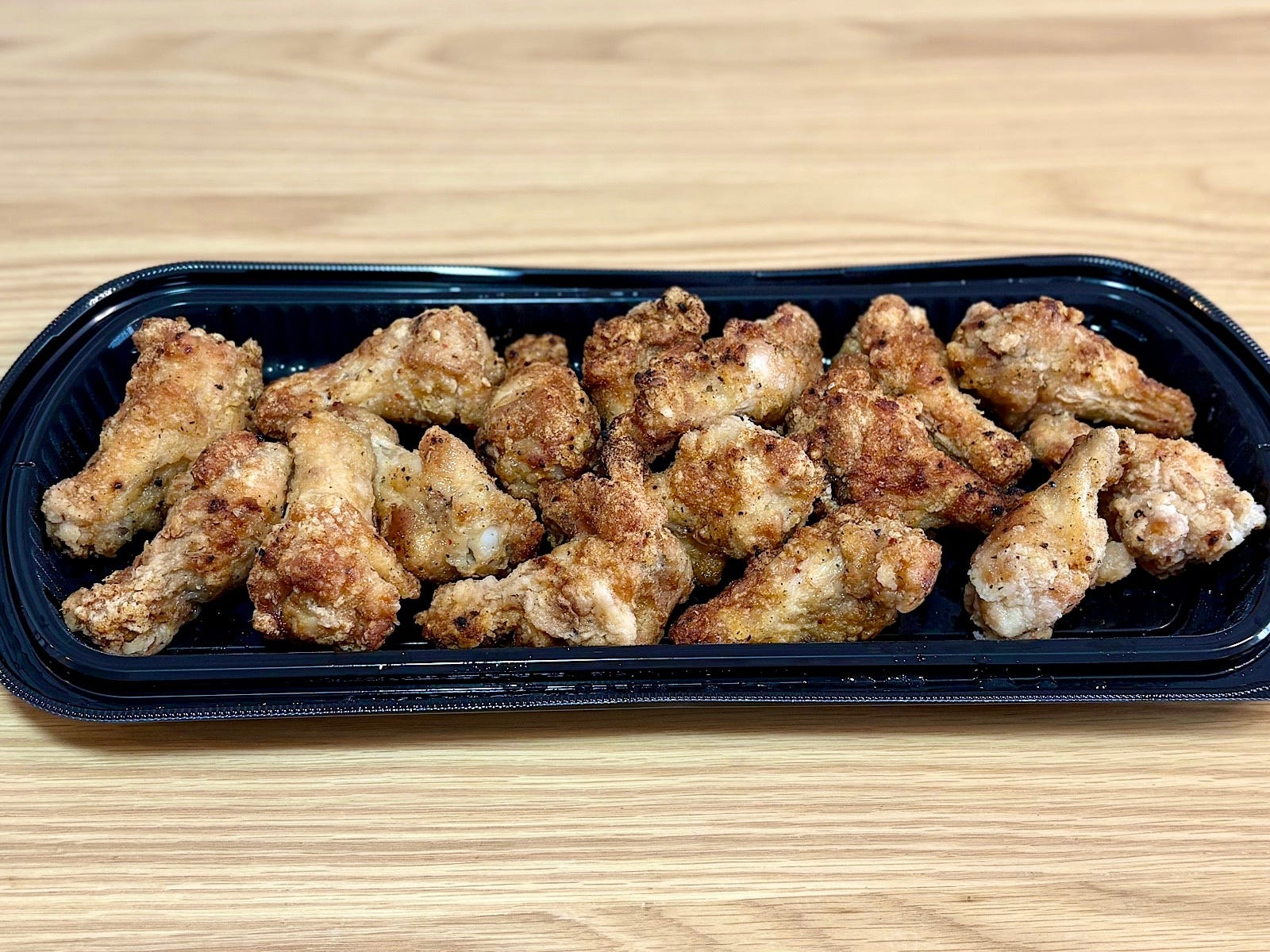 「ガーリックフライドチキン」 100gあたり198円（税込）