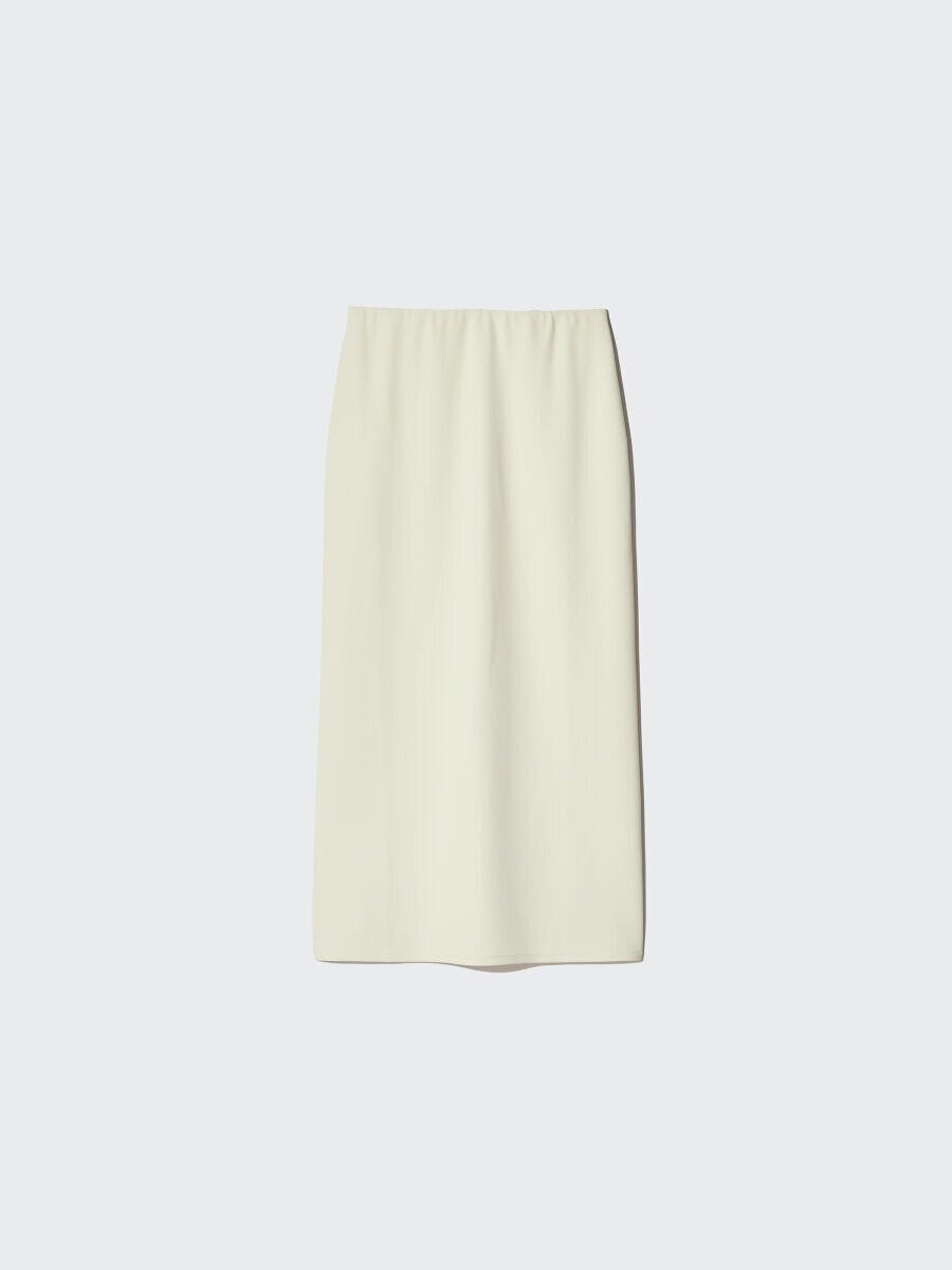 オフホワイトのクレープジャージーナロースカートを平置きで撮影 オフホワイトのクレープジャージーナロースカートを平置きで撮影