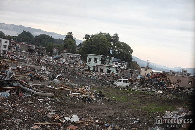 「『誰かのために』プロジェクト」／2011年（C）AKS