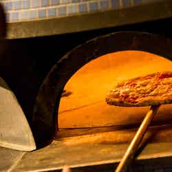 店内のピザ窯/画像提供:三信商事株式会社