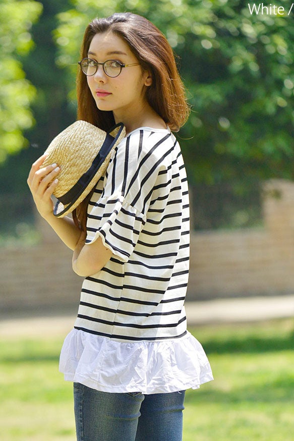 可愛く体型カバーできるレイヤード風切替フレアトップス「coca」1,880円（税込）