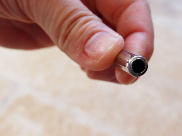 パイプ状で軽くなってるキャンドゥのスパイラル型ハンガー