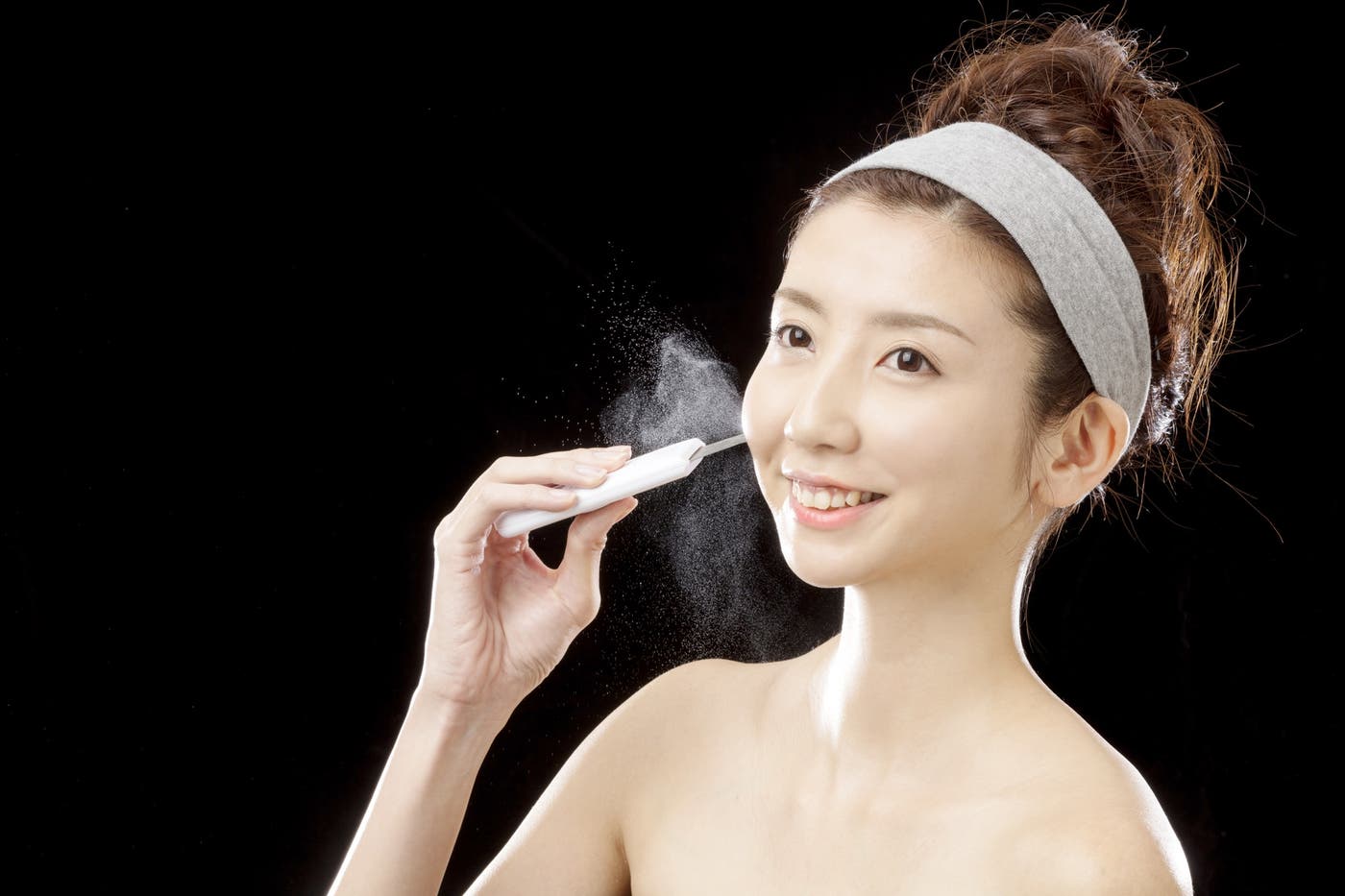 水と超音波で汚れを除去