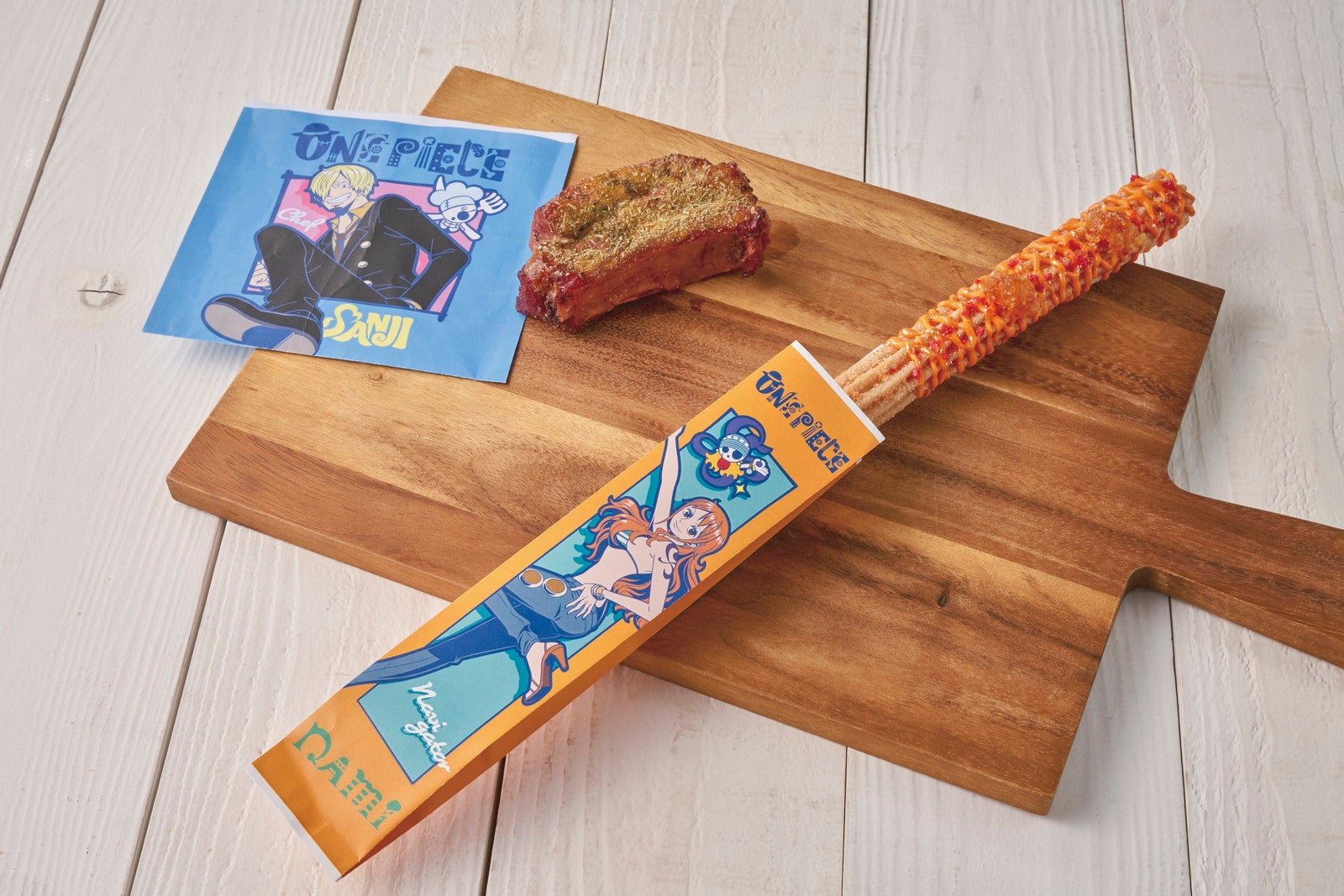 （上から）サンジ特製 ポークリブの香草焼き ～ハニーマスタード～、ナミのオレンジ・オレンジチュリトス／画像提供：ユニバーサル･スタジオ･ジャパン