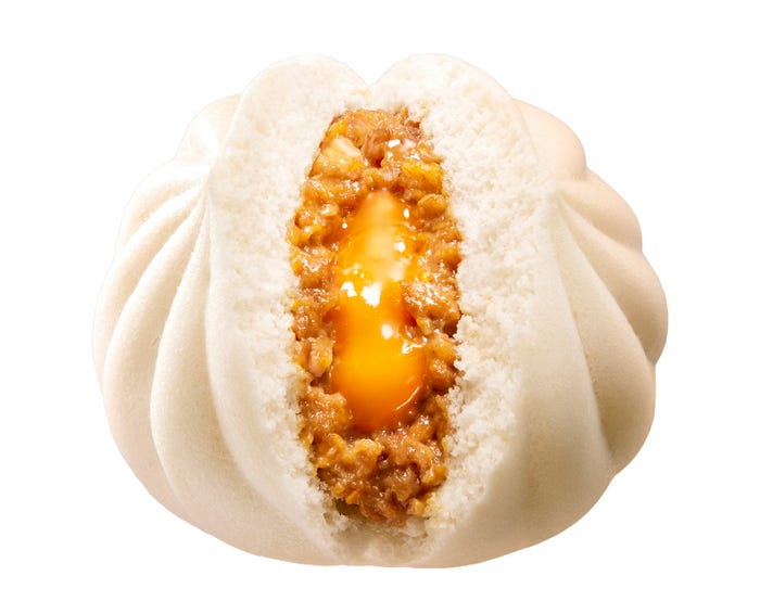 背脂ニンニク月見まん(税込210円)(提供写真)