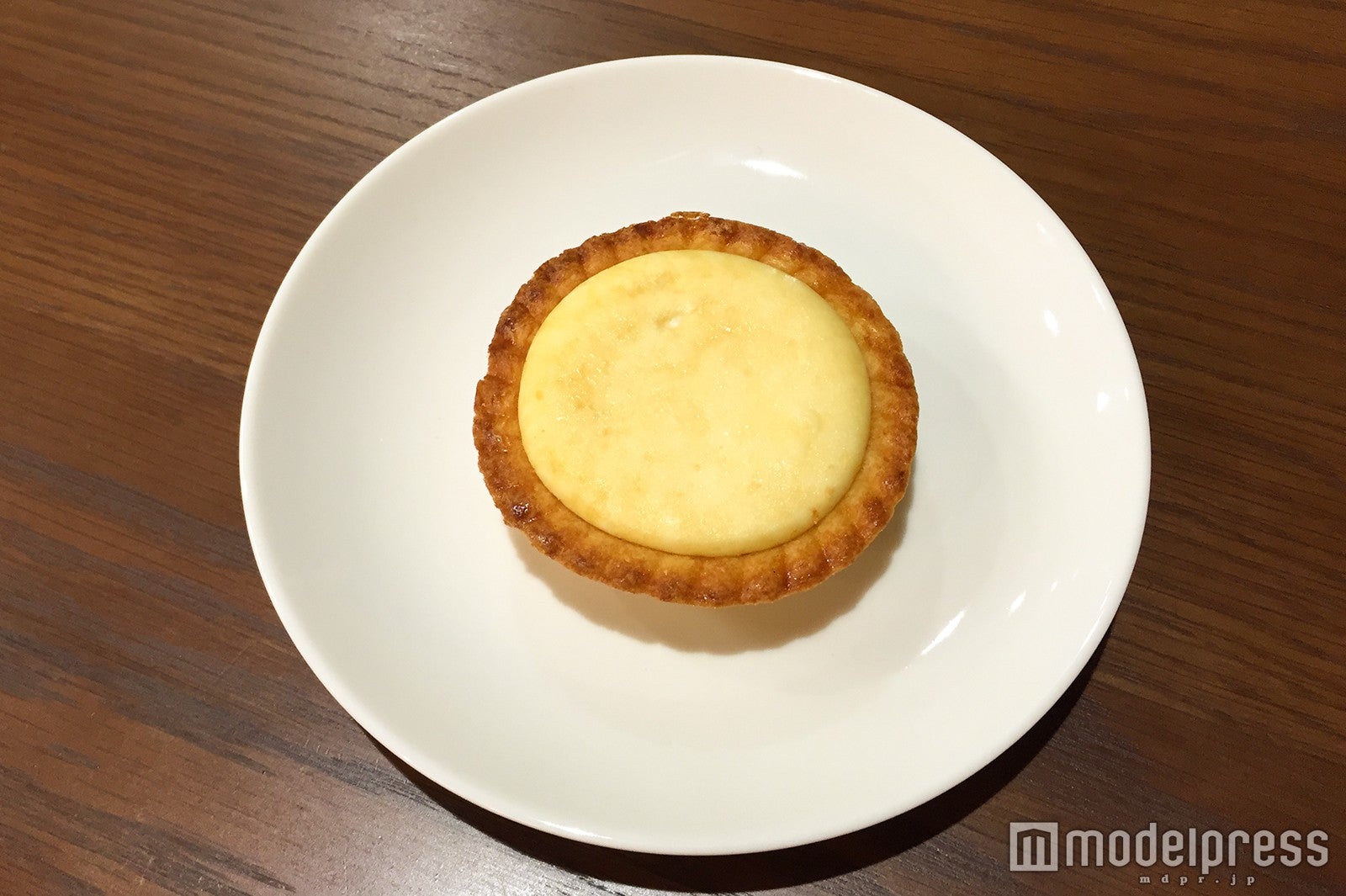 抹茶チーズタルトより若干小さめなチーズタルト（C）モデルプレス