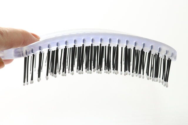 立てられる乾きやすいブローブラシ　カーブ