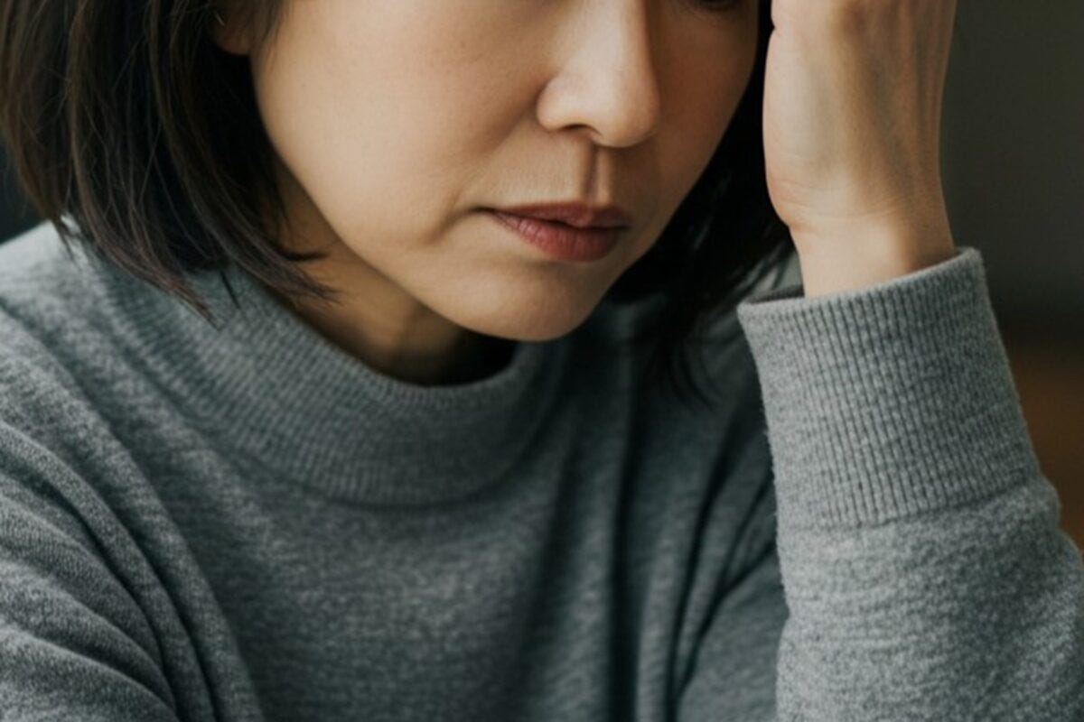 落ち込む女性