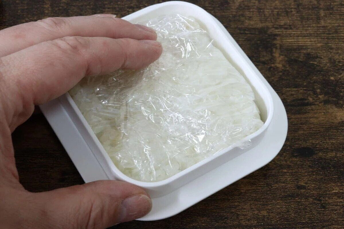 ラップパッカー　押し具で押さえる