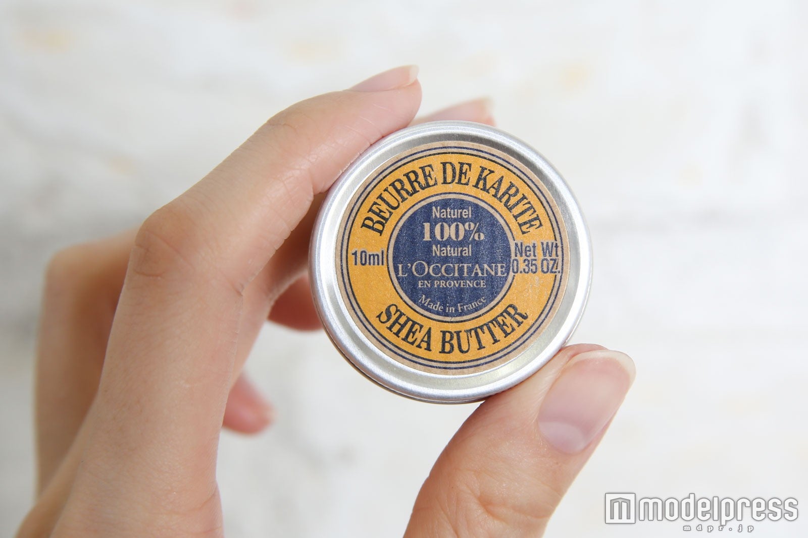 「シアバター」の小さい缶は持ち歩きに便利（C）モデルプレス