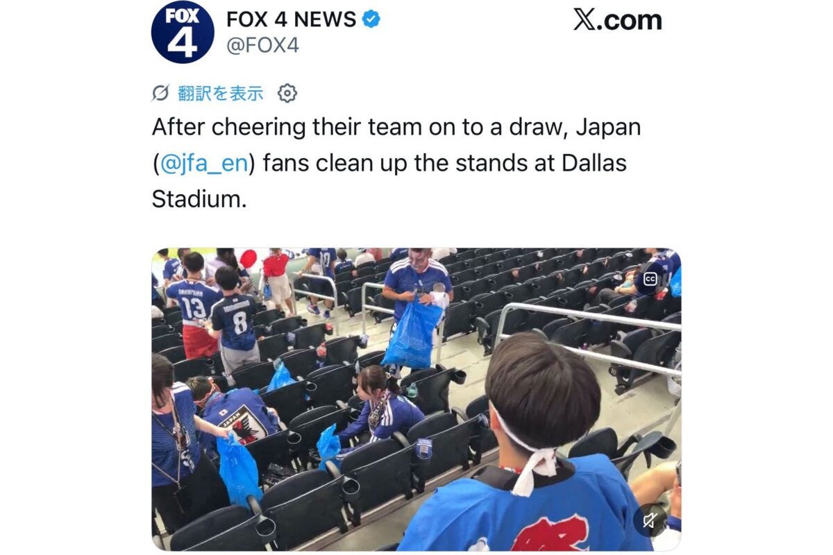 インタビューに応じる日本人サポーター