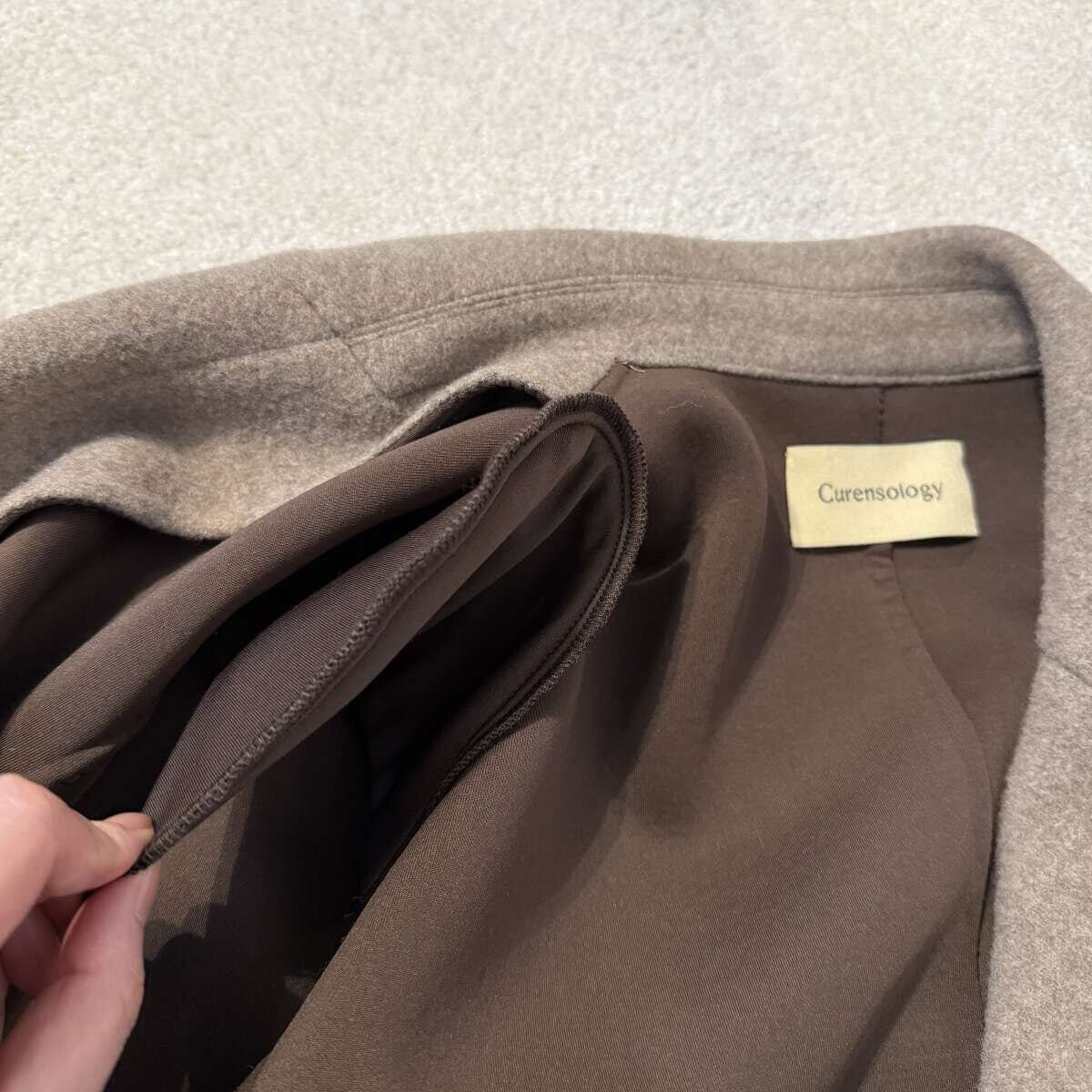 Curensologyウールボンディングジャケット Curensologyウールボンディングジャケットの肩パッド部分