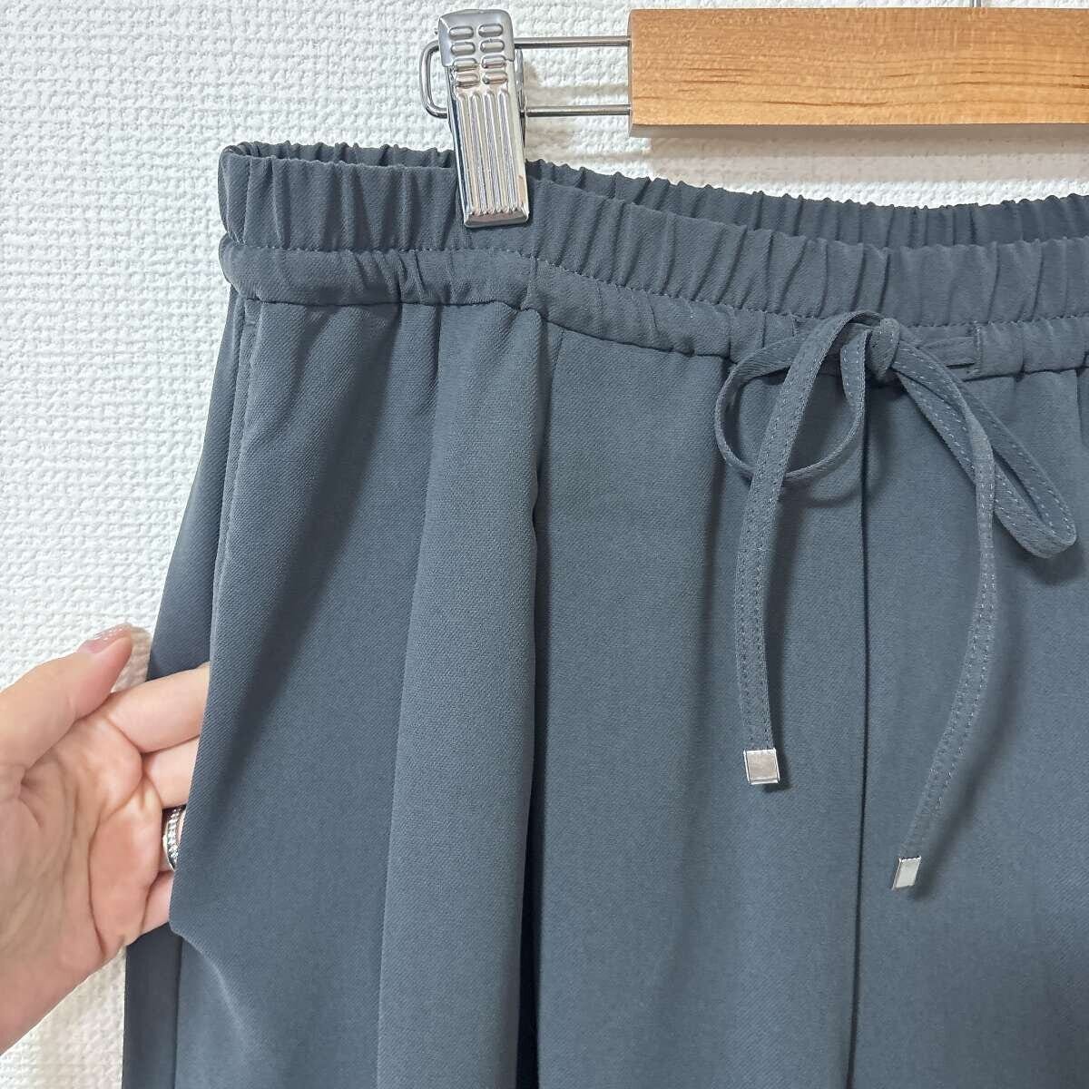 GUのドレープワイドパンツのウエストゴムとポケット、紐のアップ