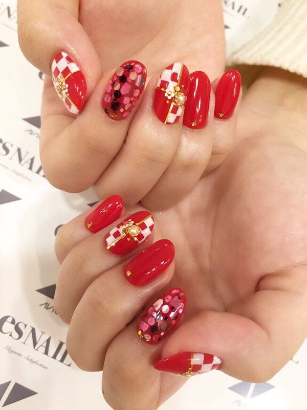 市松模様のポイント使いが◎(画像提供:esNAIL)