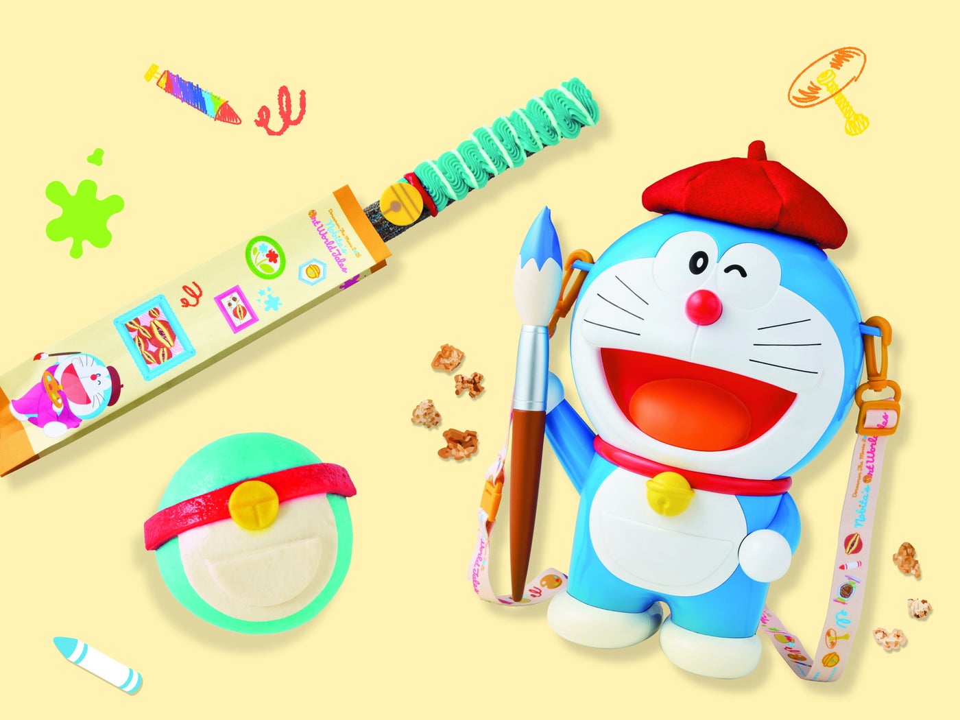 左上：ドラえもん チュリトス ～あんバター～　左下：ドラえもん ボロネーゼ＆チーズまん　販売場所：シネマ 4-D ストア前フードカート  右  ：絵かきドラえもんのポップコーンバケツ／画像提供：ユニバーサル・スタジオ・ジャパン