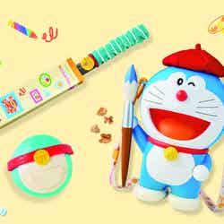 左上:ドラえもん チュリトス ~あんバター~ 左下:ドラえもん ボロネーゼ&チーズまん 販売場所:シネマ 4-D ストア前フードカート 右 :絵かきドラえもんのポップコーンバケツ/画像提供:ユニバーサル・スタジオ・ジャパン