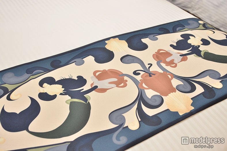 マーメイドのようなミニーのベッドスロー