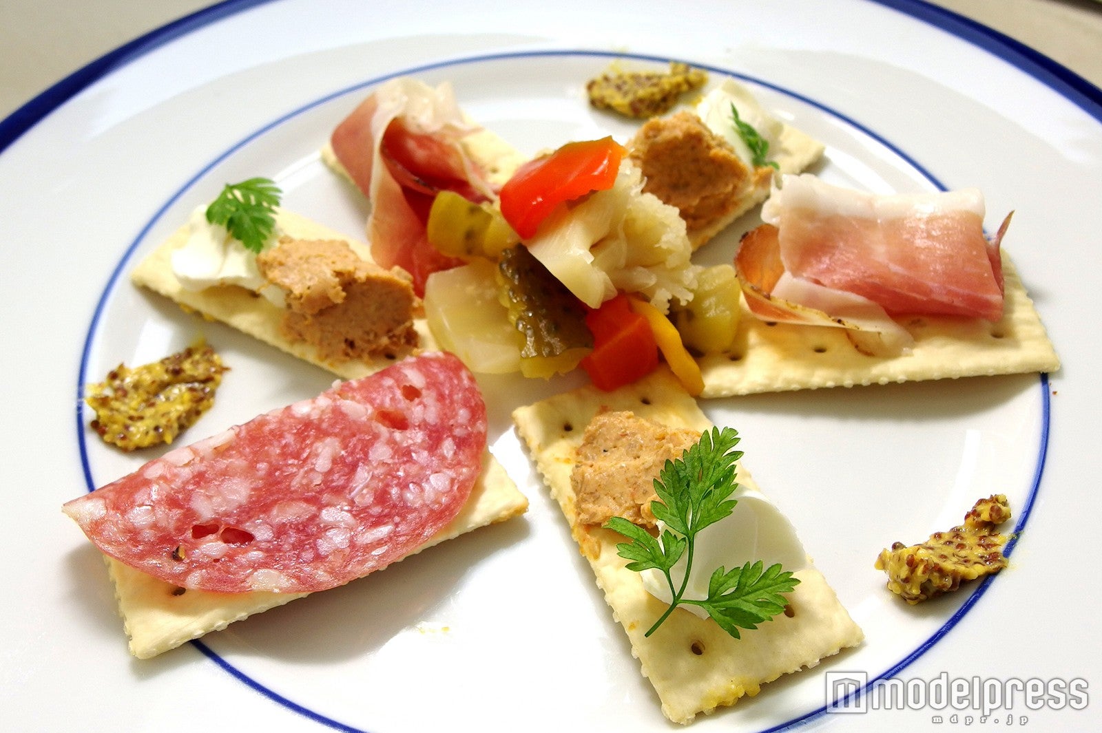 オリジナルおつまみも提供する／画像提供：セドナグローバル