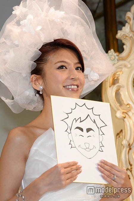 夫の似顔絵を披露