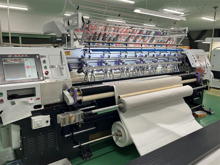 服飾副資材卸の吉岡 中国のキルトマシン販売 「国内生産を維持したい」