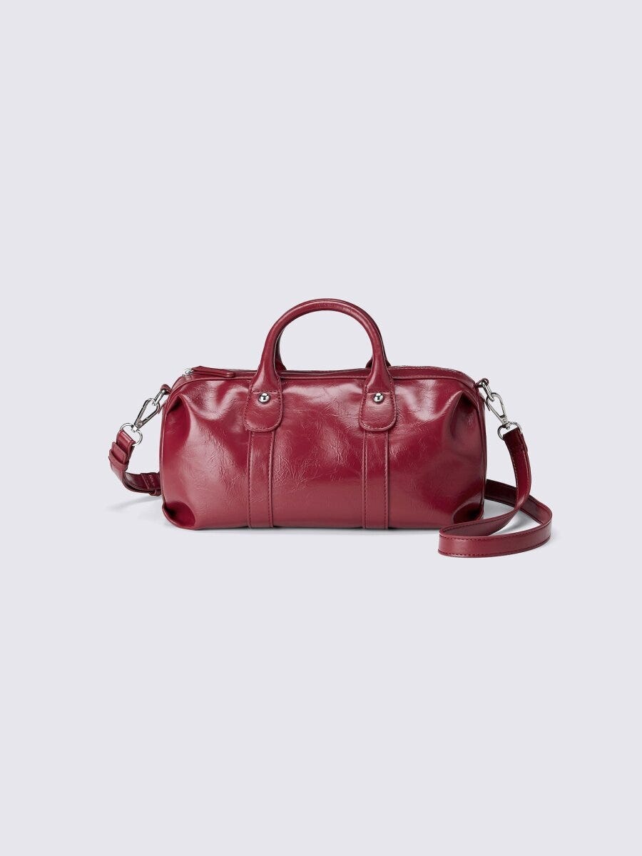 鮮やかなレッドのヴィンテージ風ダッフルミニバッグ 鮮やかなレッドのヴィンテージ風ダッフルミニバッグ