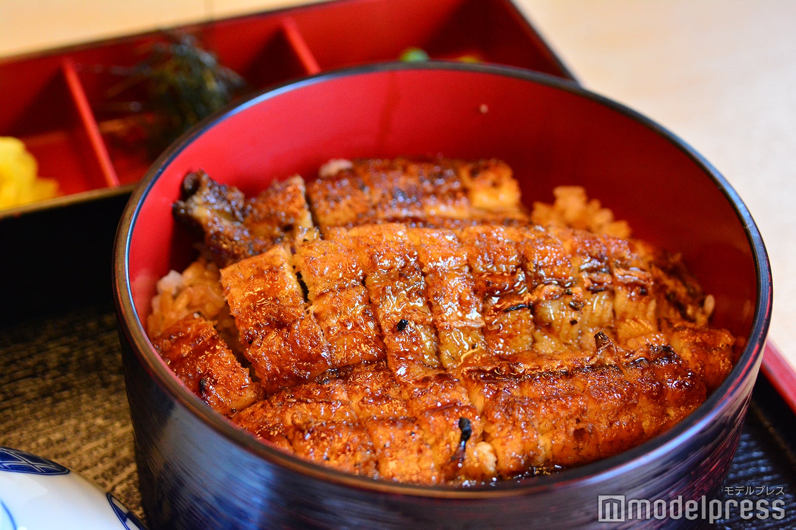 ふっくら焼き上げた身と甘辛いタレが絶妙（C）モデルプレス