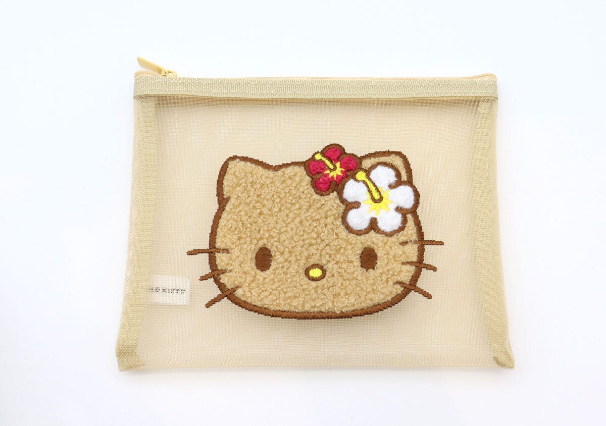 日焼けしたハローキティの顔が刺繍されたメッシュポーチ