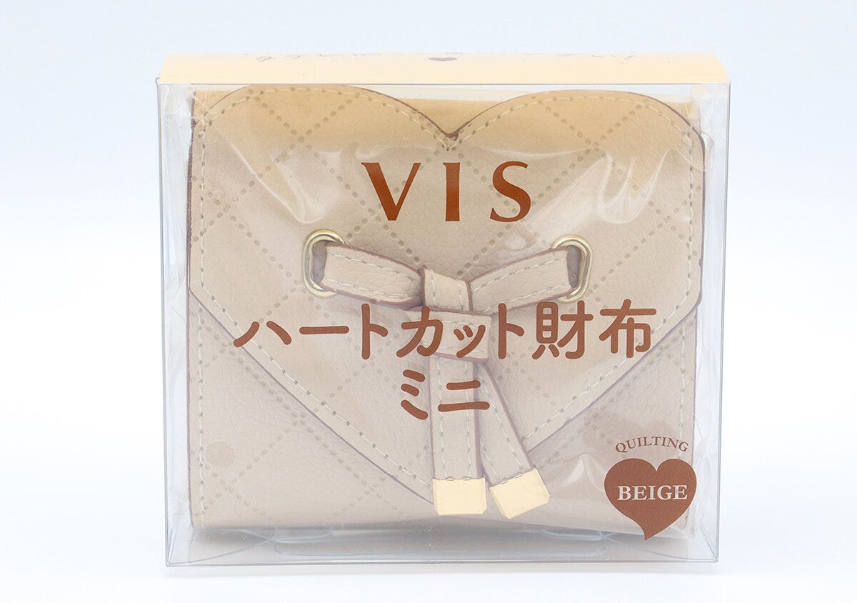 透明なパッケージに入ったベージュのVISハートカットミニ財布