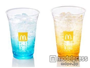 「ジャパンマックフィズ ブルーラムネ（アップル果汁0．9％）」（左）と「オランダマックフィズ パッションオレンジ（オレンジ果汁4．0％、パッションフルーツ果汁1．0％）」（右）