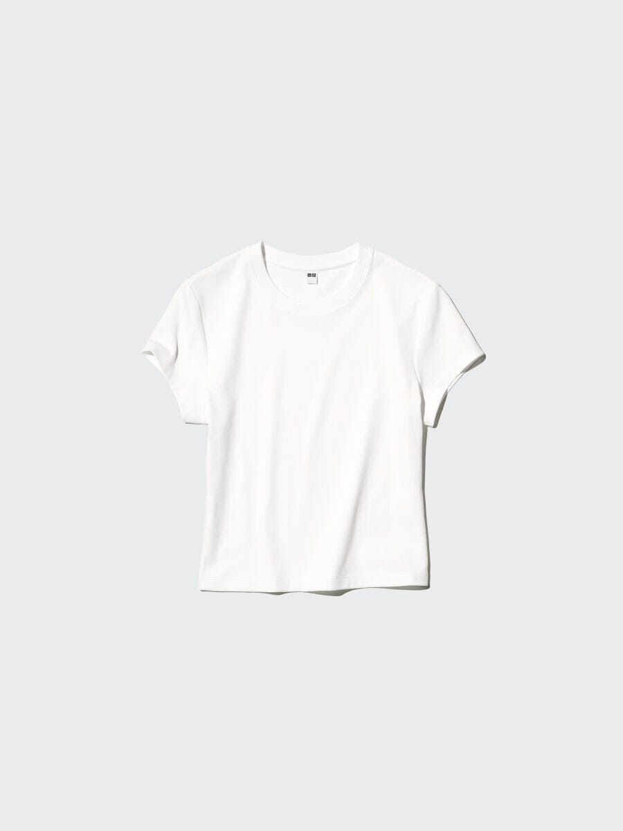 白いクルーネックの半袖ミニTシャツを平置きで撮影 白いクルーネックの半袖ミニTシャツを平置きで撮影
