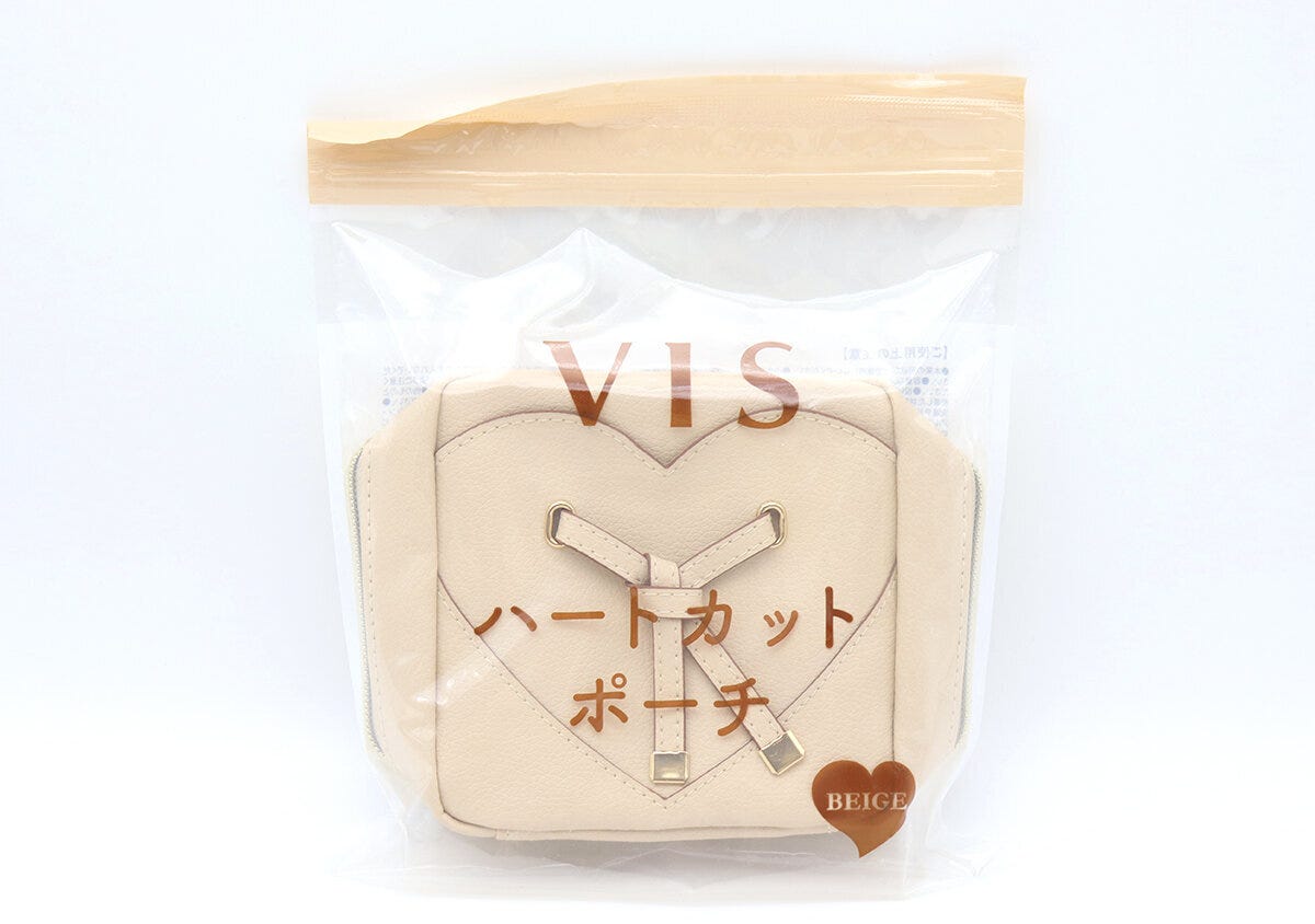 透明な袋に入ったベージュのVISハートカットポーチ。袋には商品名が書かれている。