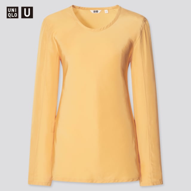 くすみイエローのクルーネックブラウス