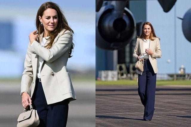 堅くなりがちなジャケットも、フロントを全開にすれば優雅に（写真：REX／アフロ、代表撮影／ロイター／アフロ）