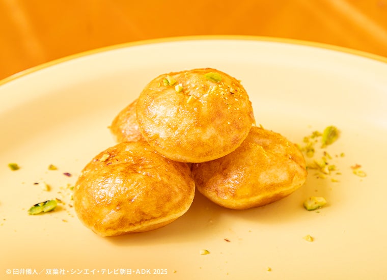 グラブジャムン風デザート（C）臼井儀人／双葉社・シンエイ・テレビ朝日・ADK 2025