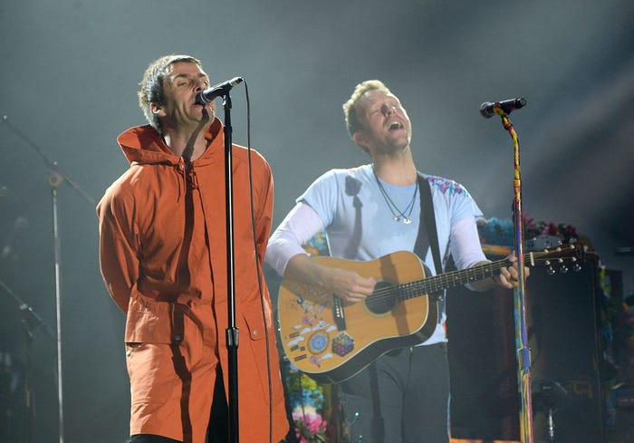 リアム・ギャラガーとコールドプレイ(クリス・マーティン) (「The One Love Manchester」/Photo:Getty)